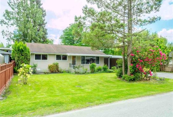 535 W 15th Street North Vancouver character home with lush front yard and mature trees in Central Lonsdale