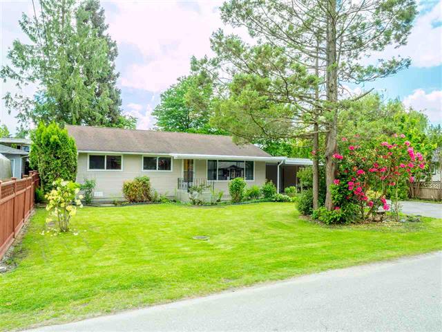535 W 15th Street North Vancouver character home with lush front yard and mature trees in Central Lonsdale